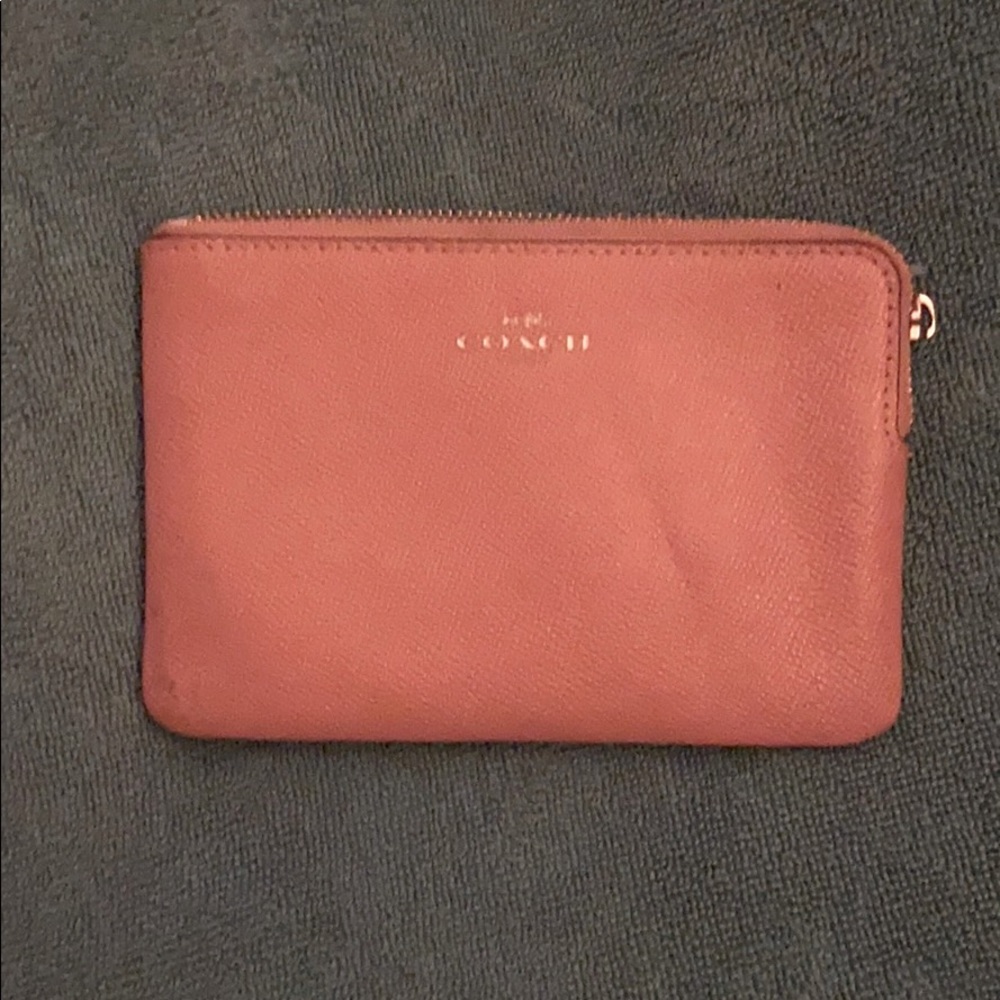 A lush pink coach Wallet